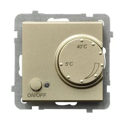 Regulator temperatury Ospel Sonata RTP-1R/m/39 w kolorze szampańskiego złota z pokrętłem regulacji i przyciskiem ON/OFF.